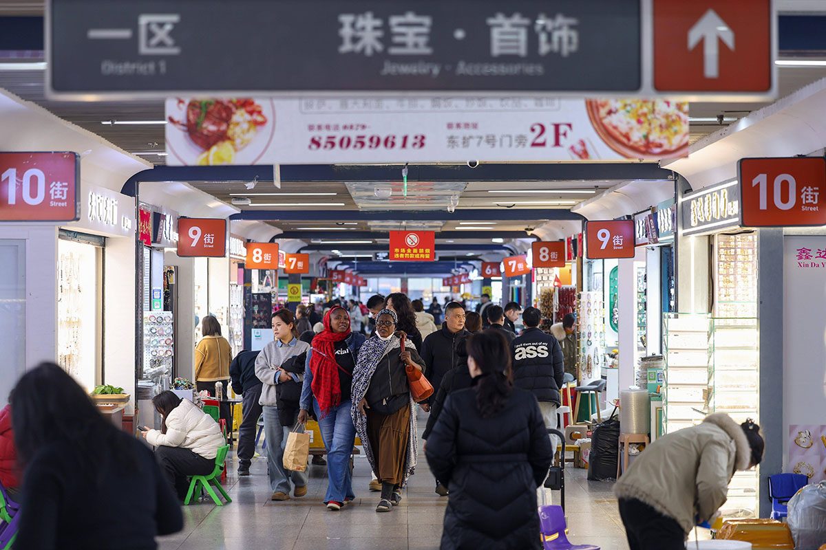 Yiwu International Trade City wholesale market showing category-specific product showrooms for electronics home goods apparel toys beauty and outdoor products.